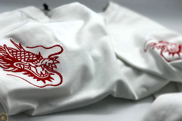 White Fabric with Red Dragon Stitched Embroidery Design