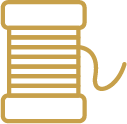 Gold Thread Spool Icon Representing Stitched Embroidery